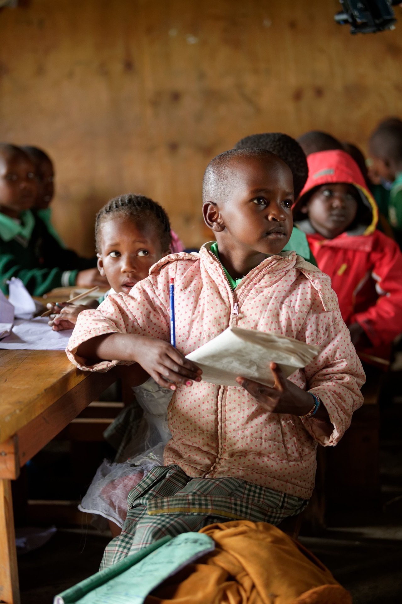 Masai Mara Solidarity - children with handbook